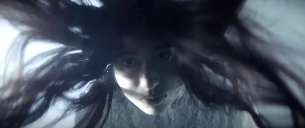 A haunting scene with a woman underwater, her long hair floating around her face, captured in an eerie, captivating moment