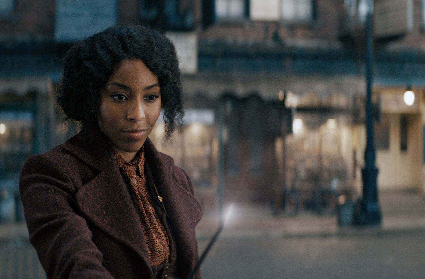 Jessica Williams holding a wand in &quot;Fantastic Beasts: The Secrets of Dumbledore&quot;