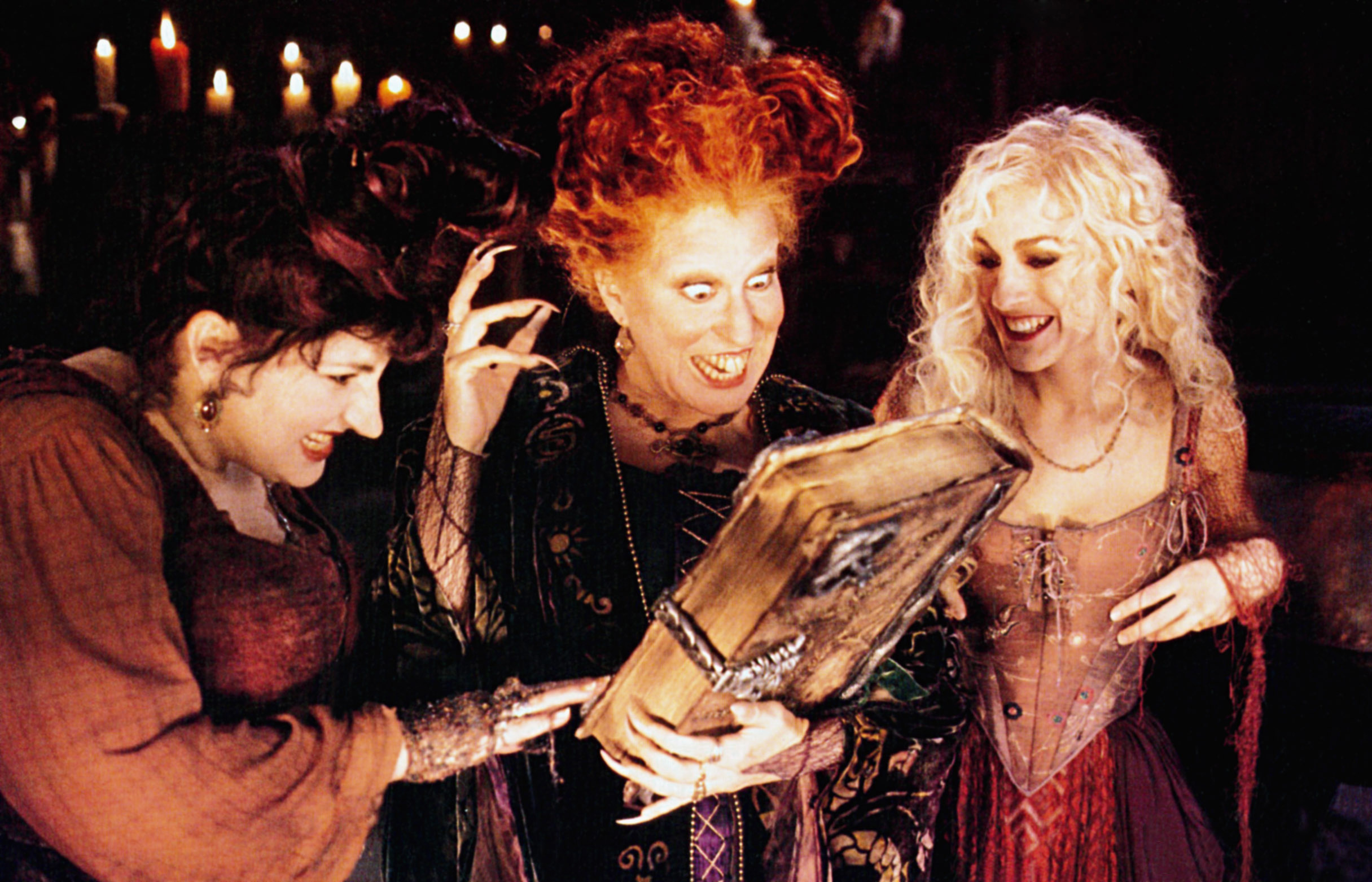 Kathy Najimy, Bette Midler, and Sarah Jessica Parker dressed as witches in &quot;Hocus Pocus&quot;