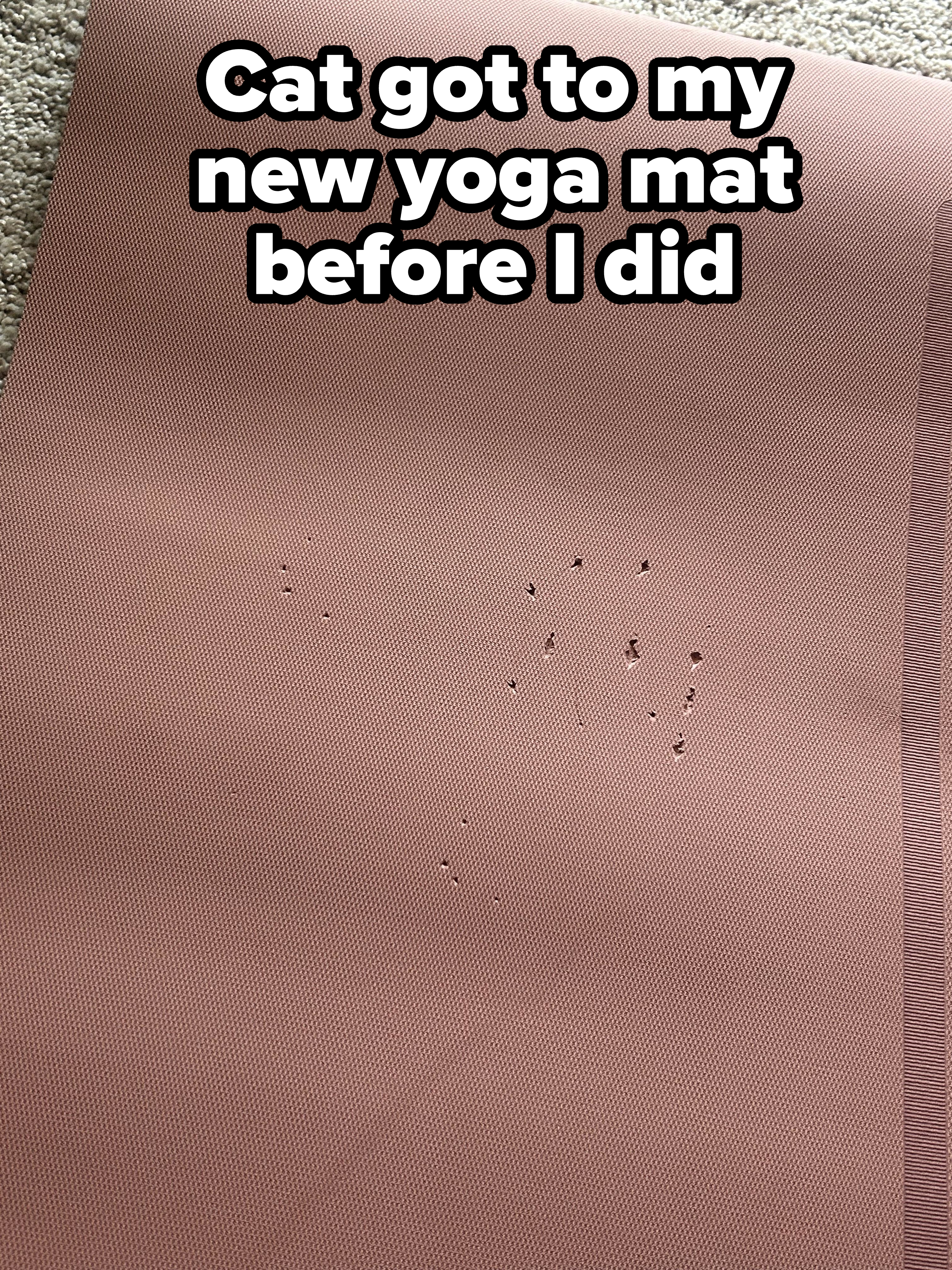 A yoga mat with multiple small punctures or holes scattered on its surface