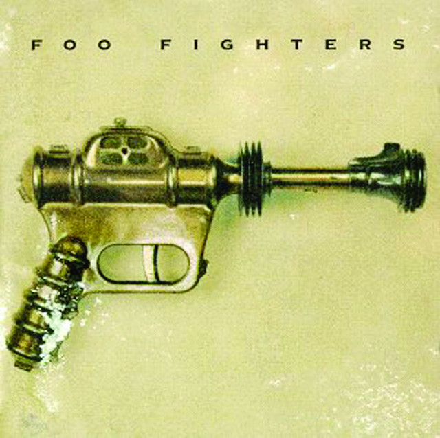 Album cover for &quot;Foo Fighters&quot; featuring an image of a futuristic-looking ray gun against a plain background