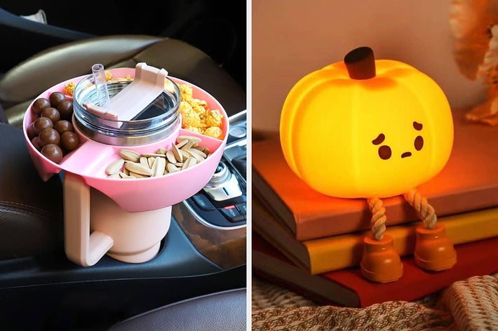 Pink car tray with snacks and tumbler in the left section, and a cute glowing pumpkin lamp with a sad face on a stack of books in the right section