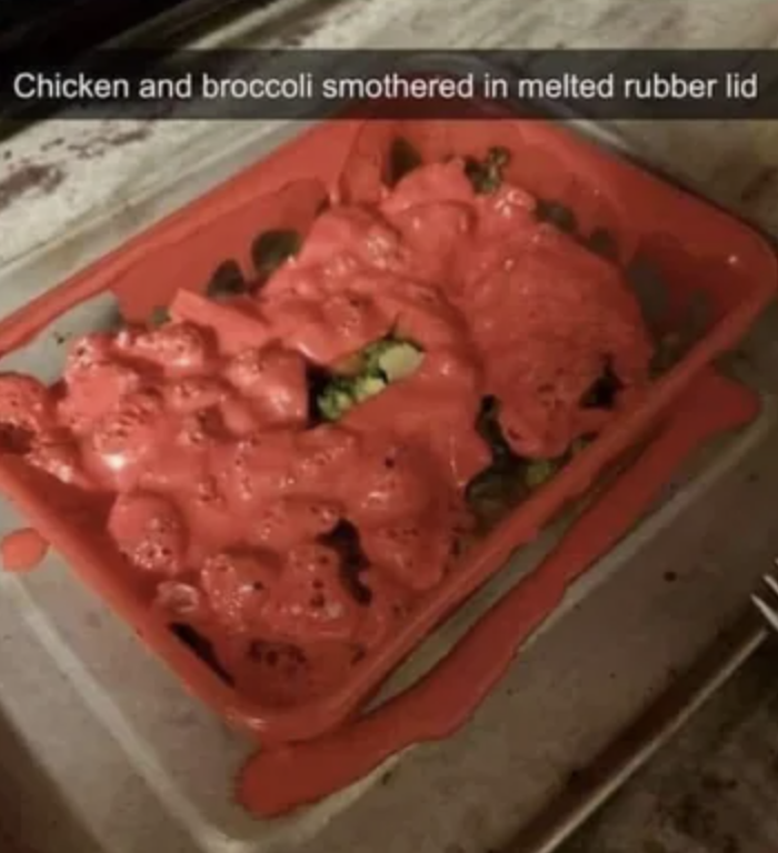 A container with broccoli and chicken covered in melted plastic. Text reads, &quot;Chicken and broccoli smothered in melted rubber lid.&quot;