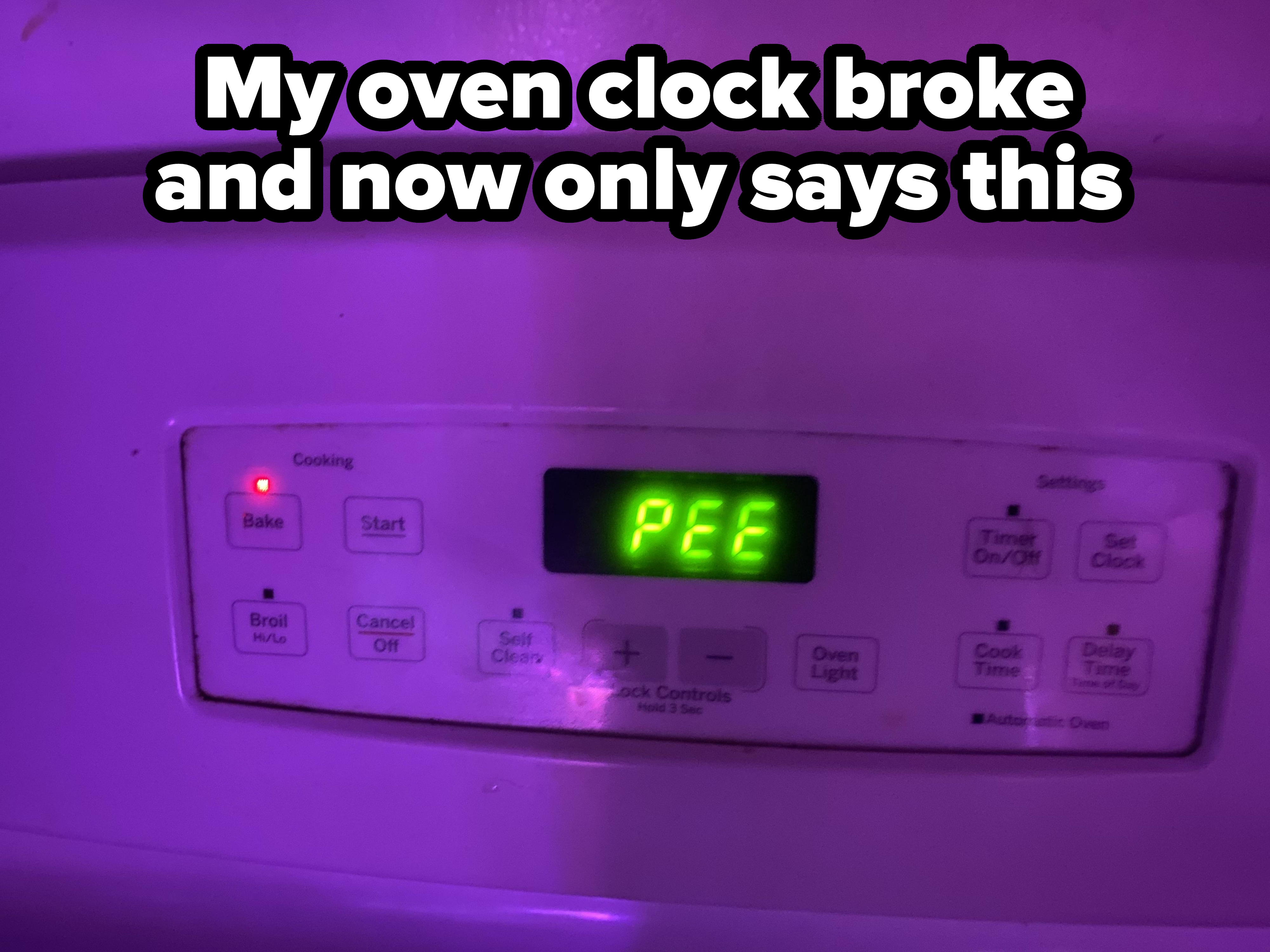 The stove&#x27;s control panel displays the word &quot;PEE&quot; in green letters, with various cooking option buttons visible around it