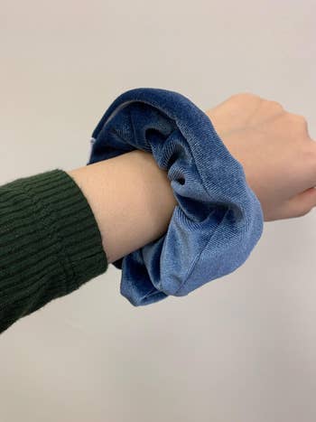 the scrunchie on reviewer's wrist