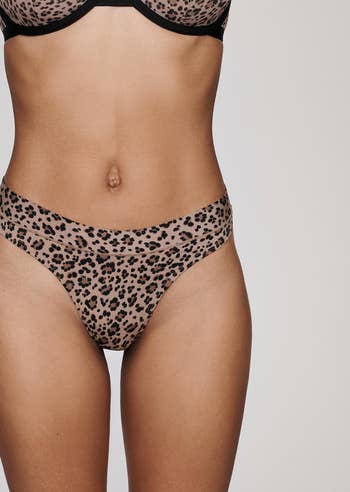 front view, model wearing leopard print thong