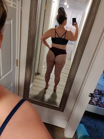 reviewer mirror selfie, back view, wearing black bra and thong