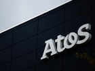 France's Atos cuts financial targets but says restructuring still on track