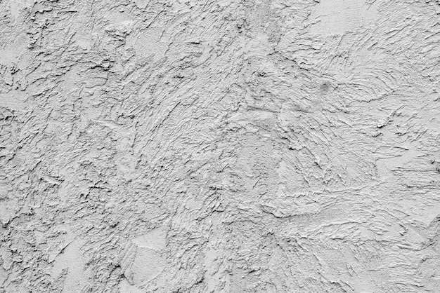 Texture, muro, sfondo concreto. Frammento di muro con graffi e crepe