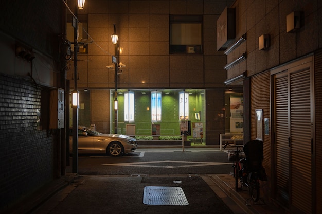 Foto grátis cidade do japão à noite com carro na rua