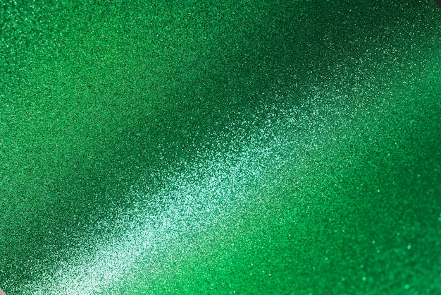 Close-up em faíscas verdes e glitter