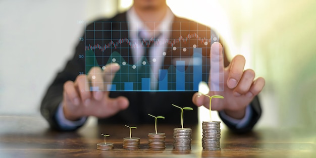 Economizando o comércio de investimento economize e obtenha lucro com juros Planta de dinheiro crescente em moedas Conceito de finanças e investimento trader investidor investidor investe metaverso