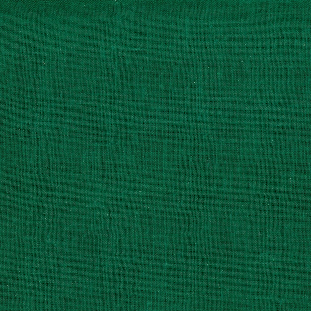 Foto fundo de textura de tecido de algodão verde escuro de estilo industrial