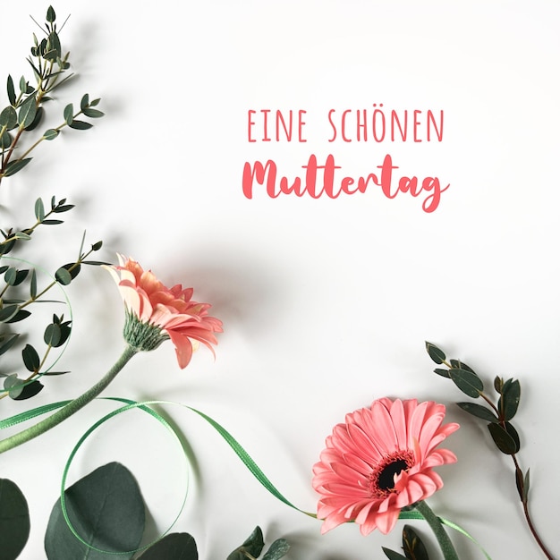 Foto text eine shonen muttertag ist einen schönen muttertag auf deutsch pink gerbera blumen und eukalyptus