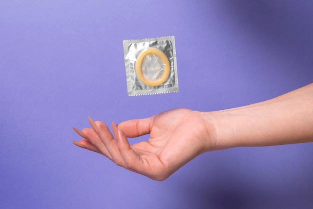 Free photo abstract sexual health composition with condom