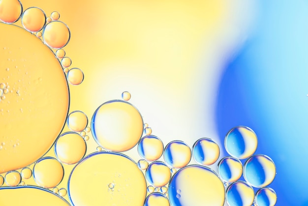 Free photo abstract yellow and blue different bubbles texture