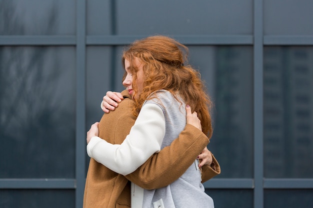 Free photo adorable couple hugging each other