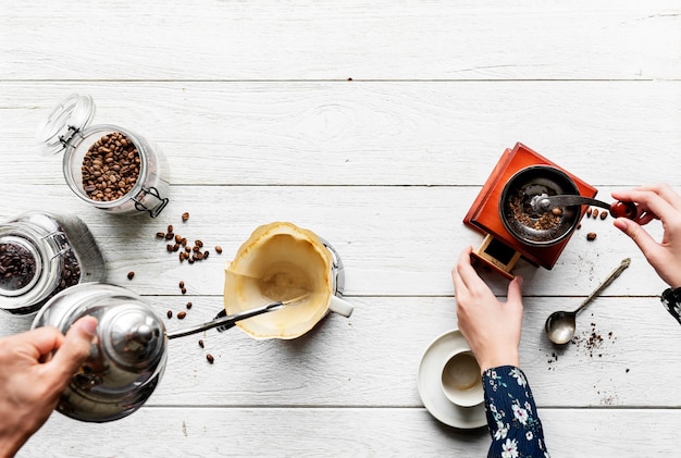 Free photo aerial view of people making drip coffee