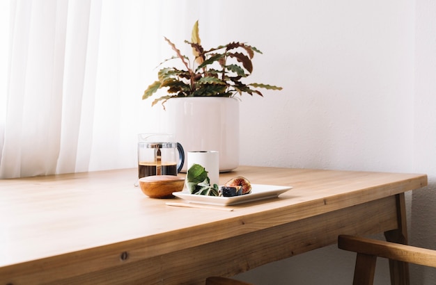 Free photo arranged snack on wooden table