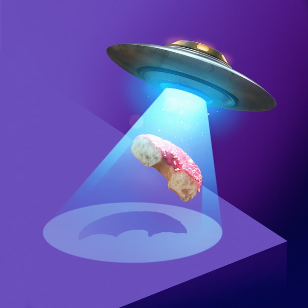 Free photo arrival of aliens concept with doughnut