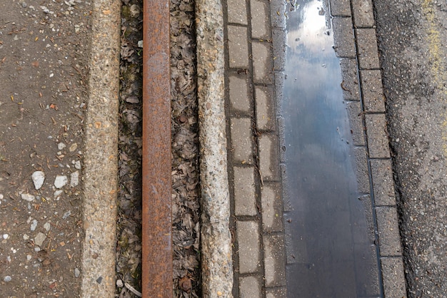 Free Photo asphalt street with train rails