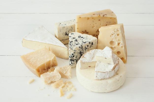 Free photo assortment of pieces of cheese