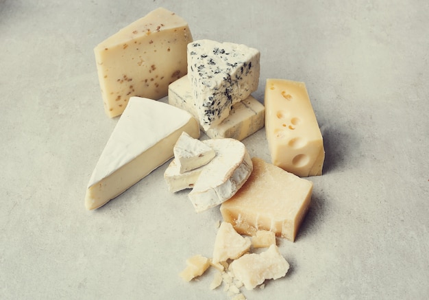 Free photo assortment of pieces of cheese