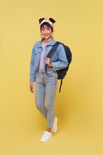 Free Photo back to school happy smiling young asian college student with backpack ready to school