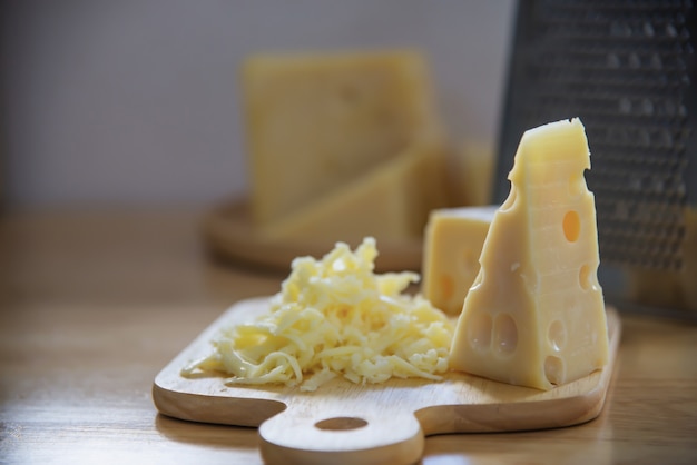 Free photo beautiful cheeses in the kitchen - cheese food preparing concept