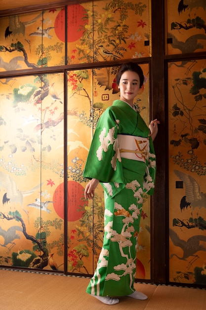 Beautiful japanese woman in a green kimono