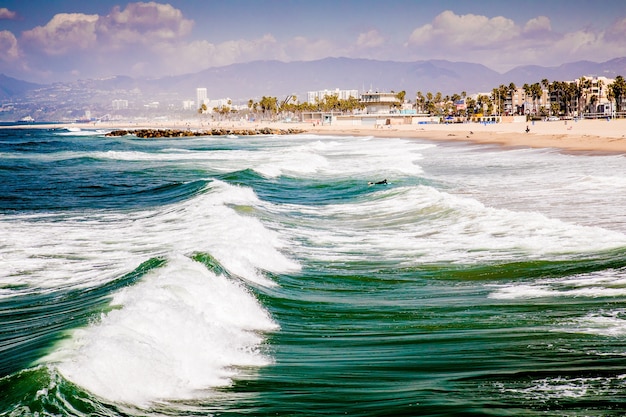 Beautiful shot of the Venice Beach with waves in California