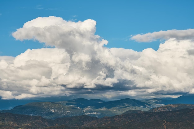 Free photo beautiful view of cumulus clouds over old mountains in antalya on the aegean coast idea for a background travel and vacation story