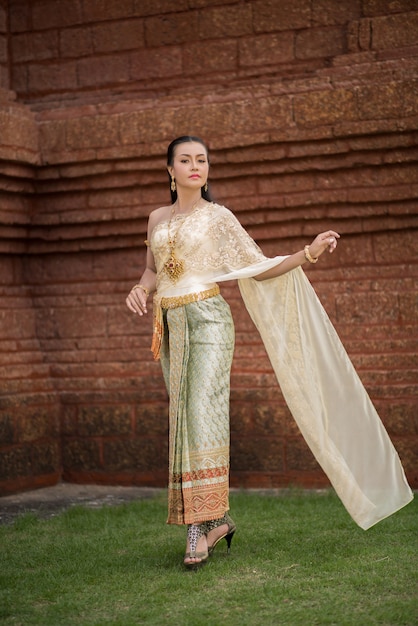 Free Photo beautiful woman wearing typical thai dress