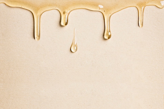 Free photo beige background wallpaper dripping oil border