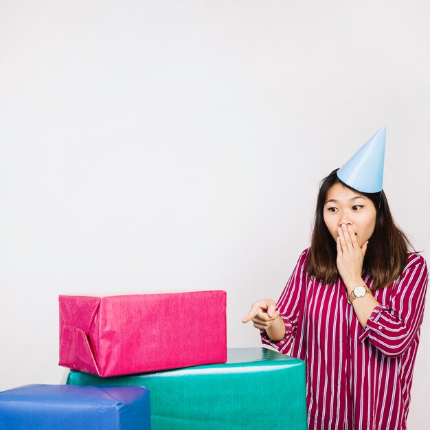 Free photo birthday woman with present boxes