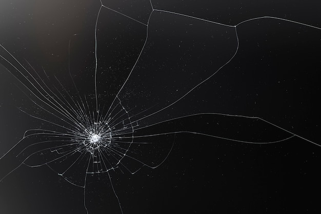 Free Photo black cracked background with broken glass texture