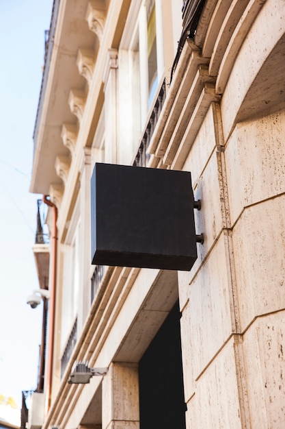 Free photo black square sign in city