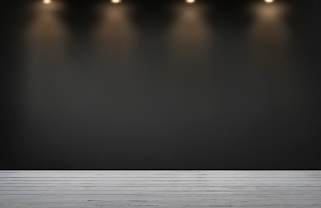 Free photo black wall with a row of spotlights in an empty room