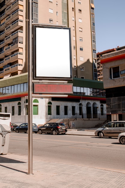 Free Photo blank box billboard for the advertisement with pole stand on street