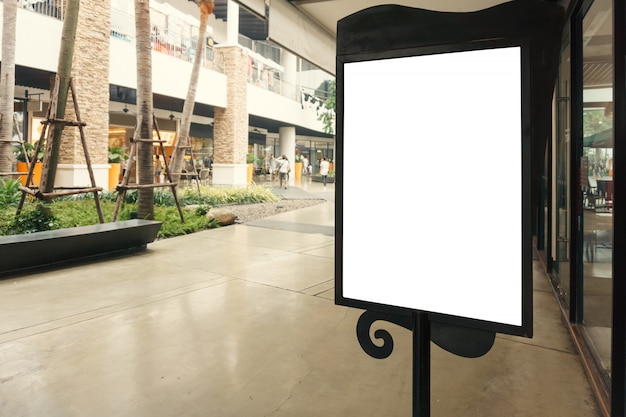 Free photo blank sign with copy space for your text message or mock up content in modern shopping mall.