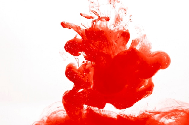 Free photo blot of red paint in water