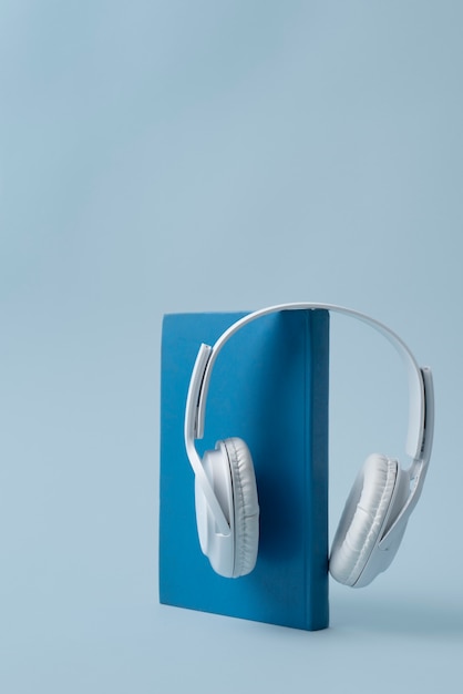 Blue book and headphones assortment