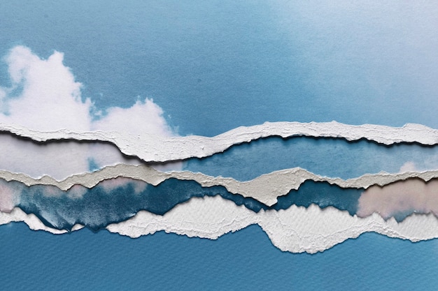 Blue sky image in torn paper style