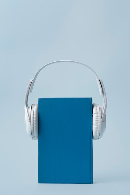 Book and headphones arrangement