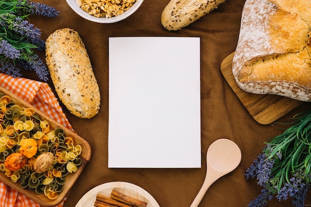 Free Photo book mockup with italian food decoration