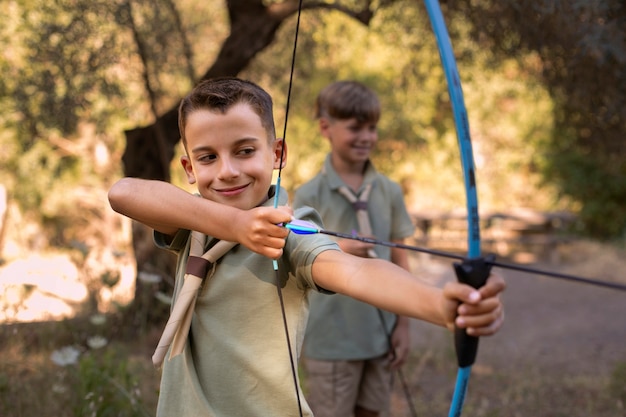 Free photo boy scouts spending time in nature