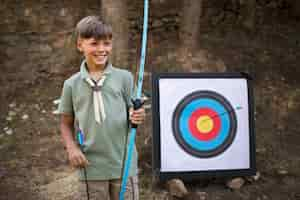 Free photo boy scouts spending time in nature