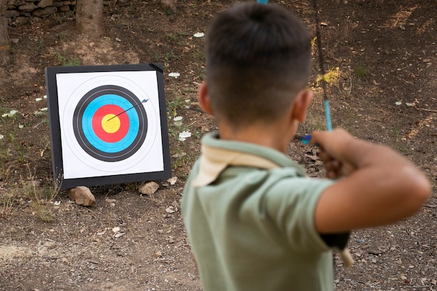 Free photo boy scouts spending time in nature