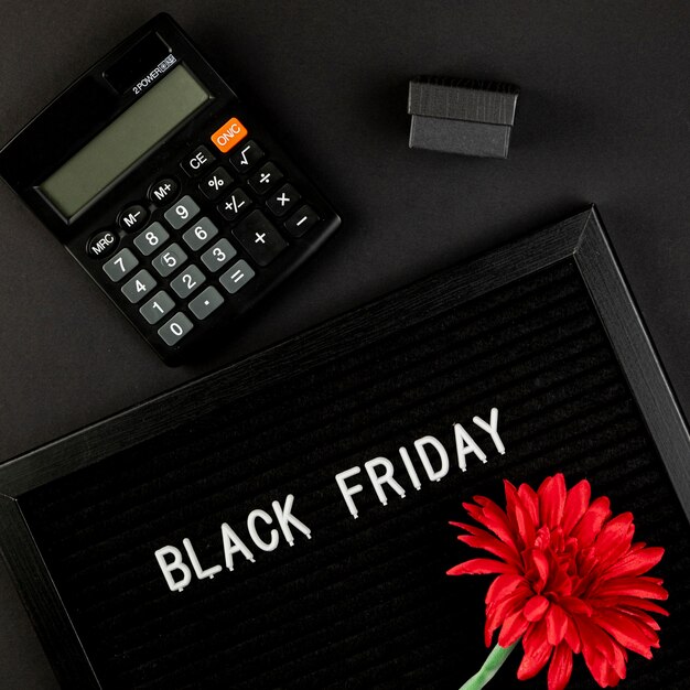 Calculator next to a black friday carpet