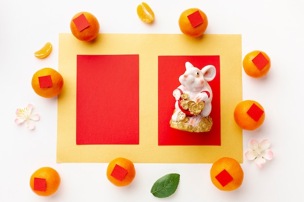 Free photo card mock-up with rat figurine chinese new year